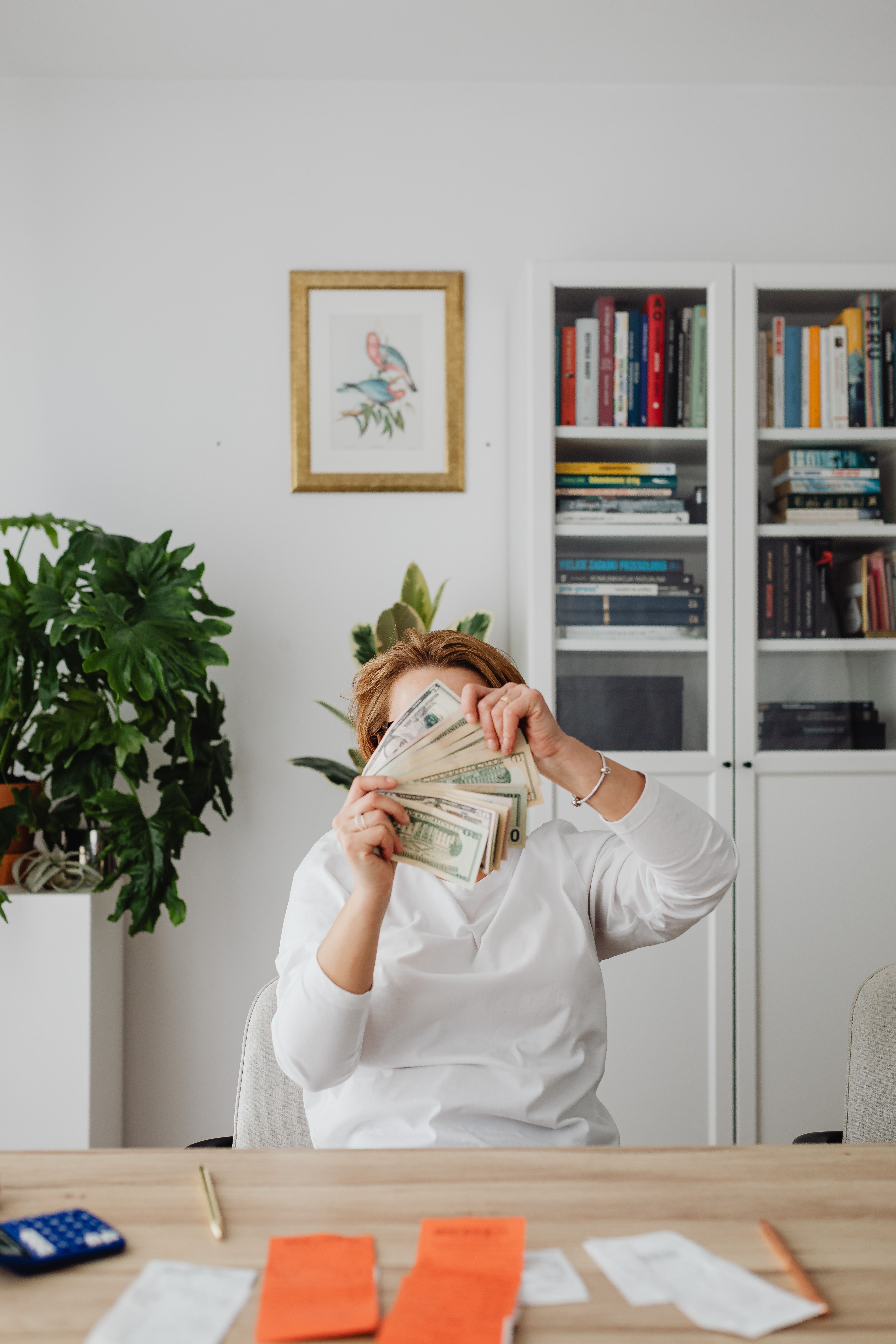 A member reviewing their monthly chit contribution at home